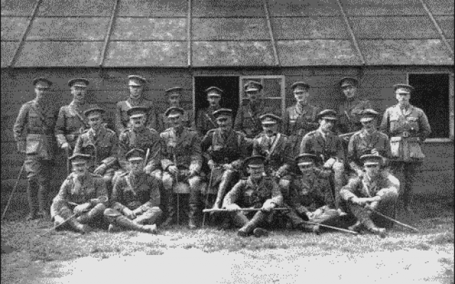 Group of Officers showing arm resting on Raymond Lodge's shoulder. (Public Domain, 'Raymond; or, Life and Death,' by Sir Oliver Lodge/ Project Guttenberg)