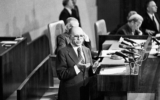 Israeli Prime Minister Menachem Begin gestures during the debate in Israel's Parliament on the expected signing of the Israel-Egypt peace treaty, in Jerusalem, March 20, 1979. During his speech Begin was continuously interrupted by hecklers. (AP Photo/Max Nash)