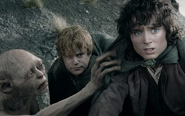 Frodo Baggins, Samwise Gamgee, and Gollum (Smeagol), from Lord of the Rings. (Screenshot)