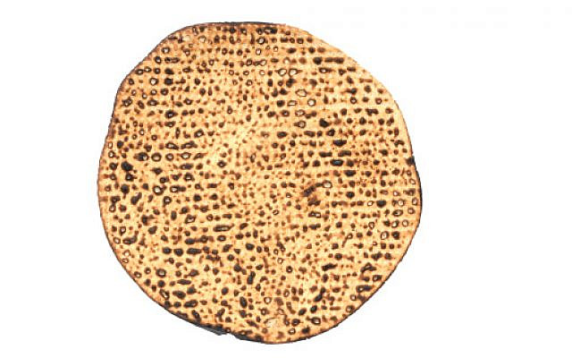 Round hand-made matza  eaten on the Jewish holdiay of Passover.
