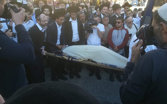 The funeral of Aryeh Schupak, killed in a terror attack at a bus stop in Jerusalem, November 23, 2022. (courtesy author)