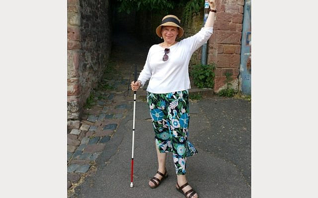 Me, standing with my cane. (courtesy)