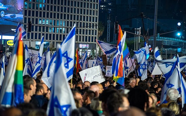 TEL AVIV, ISRAEL - January 21, 2023: Israelis protest in Tel Aviv against plans by prime minister Benjamin Netanyahu .