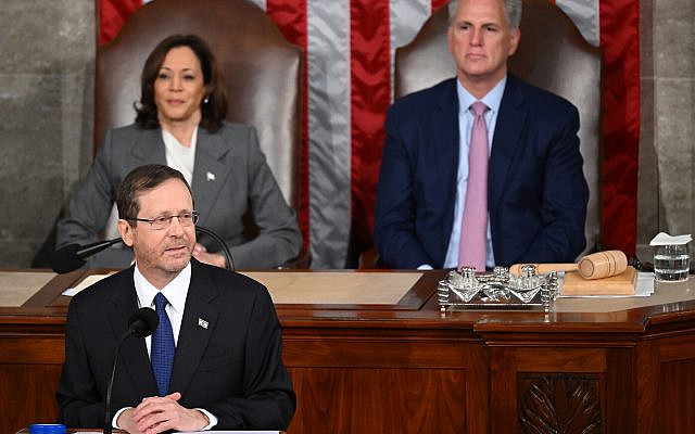 US Vice President Kamala Harris (L) and US House Speaker Kevin McCarthy (R-CA) look on as President Isaac Herzog addresses a Joint Session of Congress at the US Capitol in Washington, July 19, 2023. (Saul Loeb/AFP)