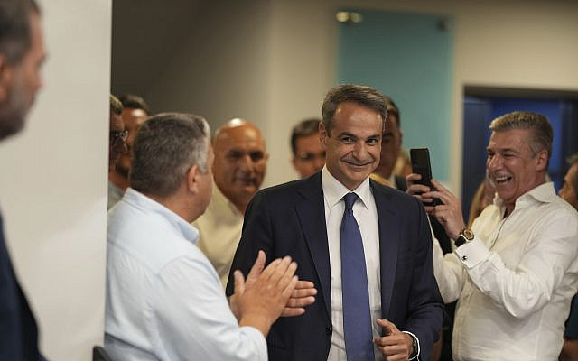 Kyriakos Mitsotakis, leader of the center-right New Democracy, arrives for statements at the headquarters of the party in Athens, Greece, June 25, 2023, the day before being sworn in as prime minister (AP Photo/Petros Giannakouris)
