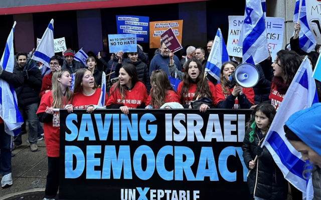Jewish youth leaders protesting outside the Washington Grand Hyatt during the visit of Israeli Finance Minister Bezalel Smotrich, March 12, 2023 (Photo credit: UnXeptable, Offir Gutelzon)