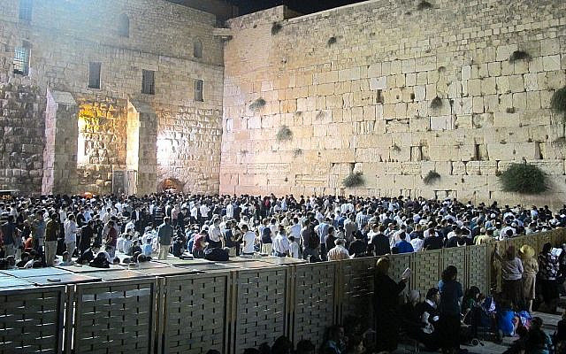 Praying, fasting and mourning the Temple's destruction on the Ninth of Av, Tisha B'Av. (Leeor Bronis/Times of Israel)