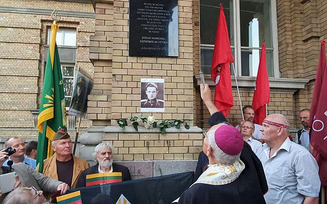 Bishop Kauneckas blesses a new monument for genocidal murderer of Jews - Jonas Noreika.
Date: September 5, 2019. Location - Vilnius, Lithuania
Source: https://alkas.lt/2019/09/06/visuomenininkai-po-mitingo-prie-prezidenturos-atidenge-nauja-atminimo-lenta-j-noreikai-nuotraukos-video/#google_vignette