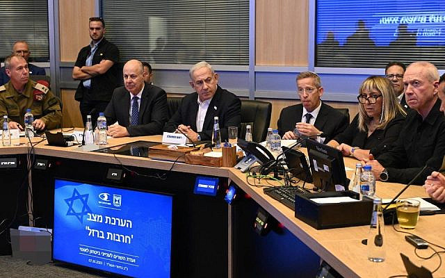 Israeli Prime Minister Benjamin Netanyahu, seated third from left, holds a meeting with his security cabinet in Tel Aviv, Oct. 7, 2023. (Haim Zach/GPO)