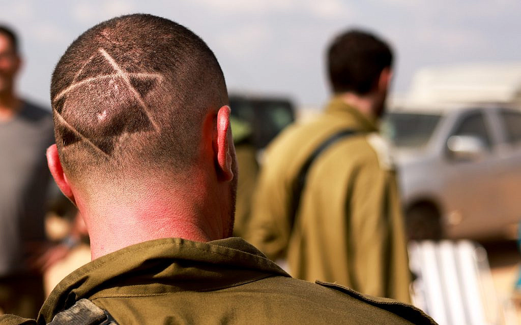 A soldier based near the southern Israeli border with Gaza, October 16, 2023. (Chaim Goldberg/Flash90)