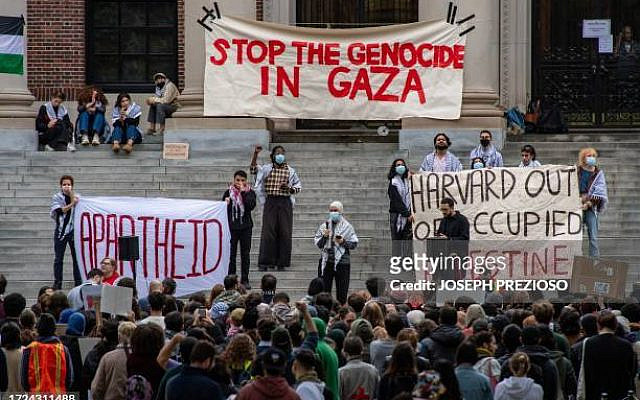 Supporters of Palestine gather at Harvard University to show their support for Palestinians in Gaza at a rally in Cambridge, Massachusetts, on October 14, 2023. Thousands of Palestinians sought refuge on October 14 after Israel warned them to evacuate the northern Gaza Strip before an expected ground offensive against Hamas, one week on from the deadliest attack in Israeli history. (Photo by Joseph Prezioso / AFP) (Photo by JOSEPH PREZIOSO/AFP via Getty Images)