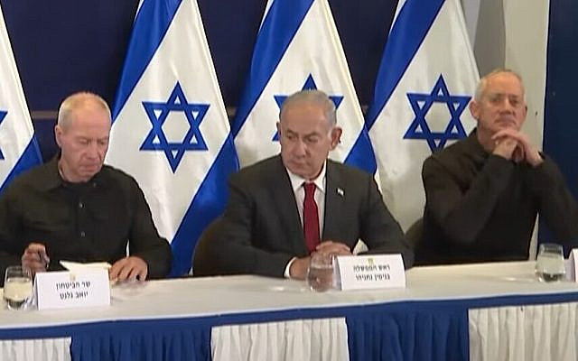 From left, Defense Minister Yoav Gallant, Prime Minister Benjamin Netanyahu, National Unity head Benny Gantz at a press conference on October 11, 2023, announcing Israel's national emergency government. (screen capture: PMO)