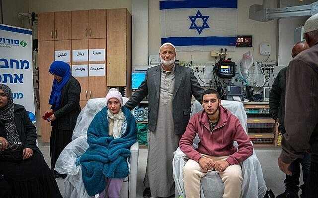 The Ziyadne siblings, Aisha and Bilal, with family at Soroka Medical Center in Beersheba after being freed from Hamas captivity, December 1, 2023. (Courtesy)