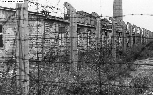 A barbed wire fence and barracks in the "Hasag Pelcery" labor camp in Czestochowa	(via Ghetto Fighters House Archives)