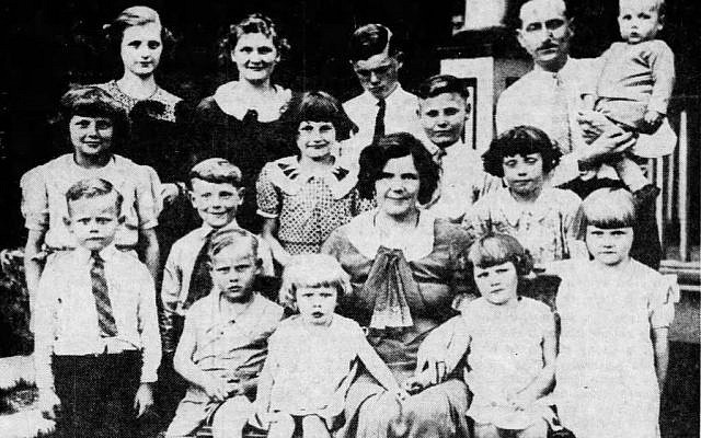 The Ambrose Harrison family with 14 children, eight born during the Great Stork Derby. (Public Domain/ St. Louis Post Dispatch 1936)