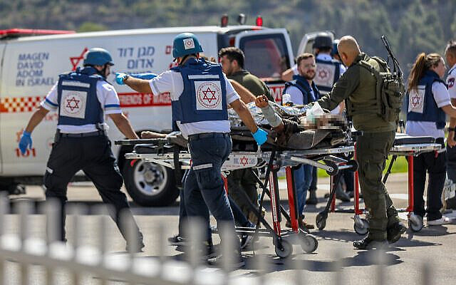 Wounded Israeli soldiers from the south arrive at the Hadassah Ein Kerem Hospital in Jerusalem, October 7, 2023. (Noam Revkin Fenton/Flash90)