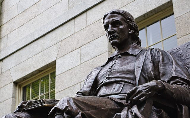Statue of John Harvard on the Harvard University campus (Harvard University / InSapphoWeTrust / via Wikipedia)
