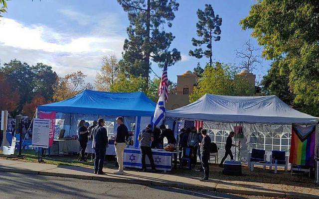 The Blue and White Tent at Stanford where students combat the pervasive disinformation and tell the truth about an indigenous people in its own land. (Photo by author)