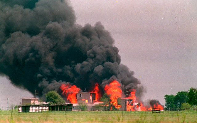 Flames engulf the Branch Davidian compound April 19, 1993 in Waco, Texas.  Eighty-one Davidians, including leader David Koresh, perished as federal agents tried to drive them out of the compound. (AP Photo/Susan Weems)