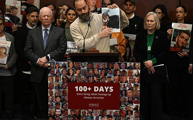 Jonathan Polin, father of hostage Hersh Goldberg-Polin, joined by other relatives of people held hostage by Hamas in the Gaza Strip, speaks during a bipartisan press conference in the US Congress, in Washington, on January 17, 2024. (Brendan SMIALOWSKI / AFP)