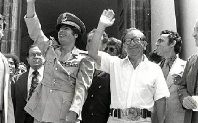 Muammar Gaddafi and Prime Minister Mintoff waving to the crowd at the main entrance to the Auberge de Castille, Malta, 31 March 1979  (Image courtesy of author)