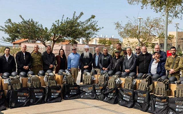 Druze religious and community leaders, security officials, and IDF officers accept 16 security kits donated by JUF and the International Fellowship of Christian and Jews (IFCJ).     IFCJ photo, with permission.