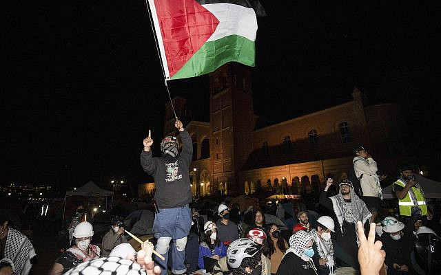 Pro-Palestinian demonstrators gather on the UCLA campus Wednesday, May 1, 2024, in Los Angeles. (AP Photo/Ethan Swope)