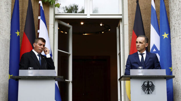 German Foreign Minister Heiko Maas and Israeli Foreign Minister Gabi Ashkenazi attend a news conference in front of the Liebermann Villa at the Wannsee lake in Berlin, Germany, August 27, 2020. (Michele Tantussi/Pool Photo via AP)