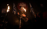 اعتراضات ضد-دولت در تل آویو، ۱۴ ژانویهٔ ۲۰۲۳. (AP Photo/Oded Balilty)