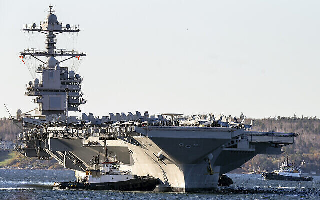 تصویر: USS جرالد فورد، یکی از بزرگترین ناوهای هواپیمابر جهان در ۲۸ اکتبر ۲۰۲۲ وارد هالیفکس می-شود.
(Andrew Vaughan/The Canadian Press via AP)