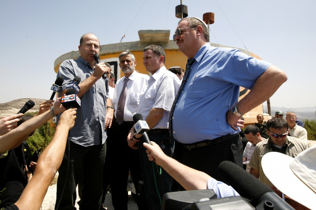 From left: Vice Prime Minister Moshe Ya'alon, Interior Minister Eli Yishai, Information Minister Yuli Edelstein, and Science and Technology Minister Daniel Hershkowitz visit the evacuated settlement of Homesh in the West Bank in 2009. (Photo credit: Miriam Alster/Flash90)