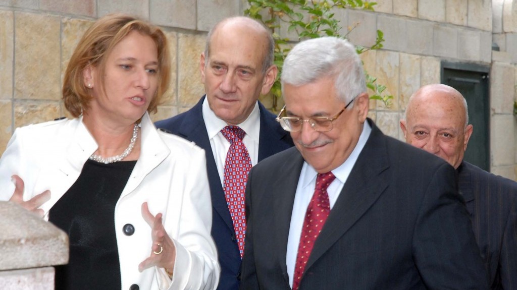 Then-foreign minister Tzipi Livni, then-prime minister Ehud Olmert, Palestinian Authority President Mahmoud Abbas and Palestinian negotiator Ahmed Qurei, during a meeting in Jerusalem in November, 2007 (photo credit: Moshe Milner/GPO/Flash90)