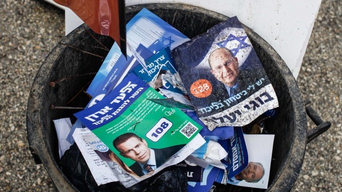 Discarded campaign flyers rest in a trash can following the Likud party primaries on Nov 25, 2012 (photo credit: Uri Lenz/Flash90)