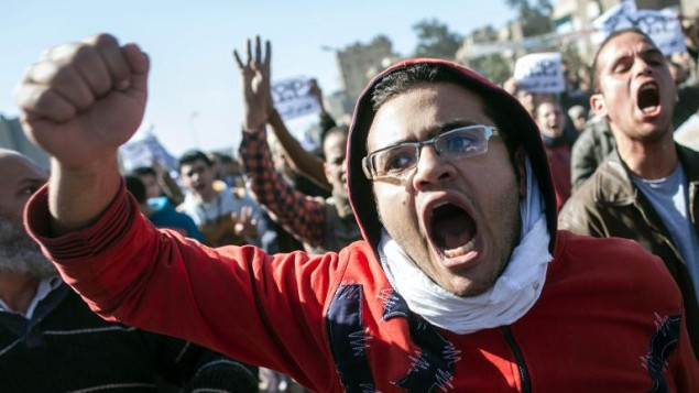 Manifestants égyptiens au Caire, le 25 janvier 2014. (Crédit : AFP/Mahmoud Khaled)
