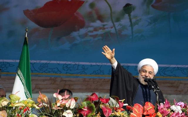 Le président iranien Hassan Rouhani à Téhéran, le 11 février 2014. (Crédit : AFP/Atta Kenare)