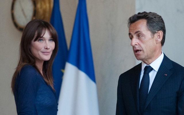 Nicolas Sarkozy et son épouse Carla Bruni-Sarkozy (Crédit : Martin Bureau/AFP)