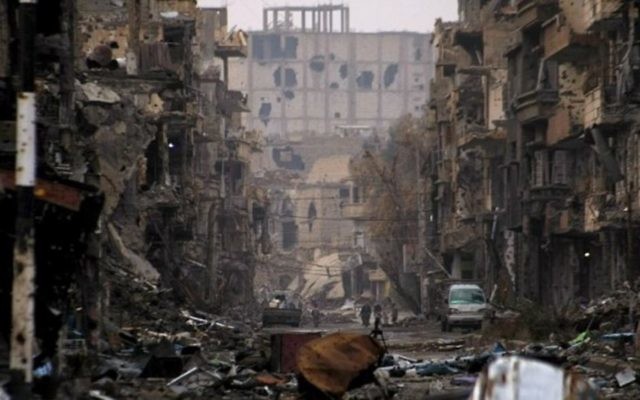 Une rue de Syrie ravagée par la guerre, en 2014. (Crédit : AFP)