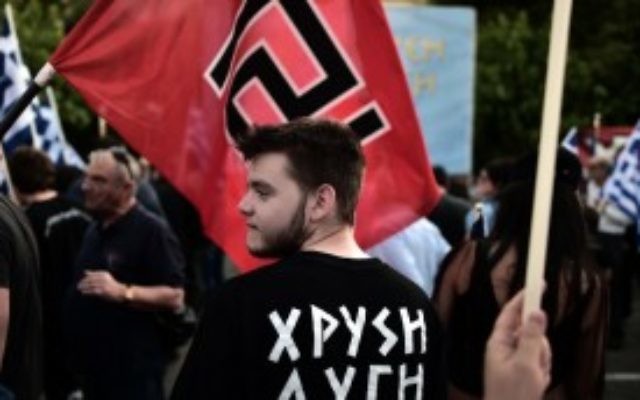 Des partisans du parti ultra nationaliste grec Aube dorée. Illustration. (Crédit : Aris Messinis/AFP)