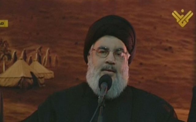 Hassan Nasrallah, le chef du Hezbollah, lors d'une rare apparition publique, à Beyrouth, au Liban, le 3 novembre 2014. (Crédit : AFP/al-Manar)