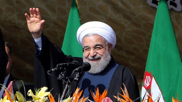 Le président iranien Hassan Rouhani pendant un rassemblement place Azadi [place de la Liberté] à Téhéran pour marquer le 37e anniversaire de la Révolution islamique, le 11 février 2016. (Crédit : AFP/Atta Kenare)