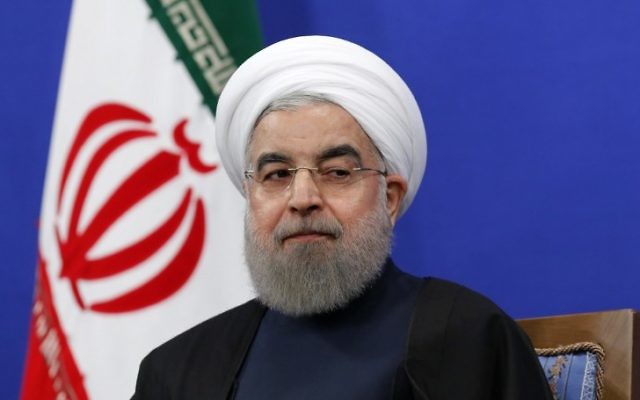 Hassan Rouhani, président iranien, pendant une conférence de presse à Téhéran, le 17 janvier 2017. (Crédit : Atta Kenare/AFP)