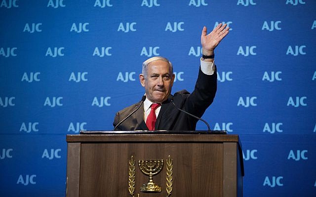 Le Premier ministre Benjamin Netanyahu lors du forum global de l'AJC (American Jewish Committee) de Jérusalem, le 10 juin 2018 (Crédit :  Yonatan Sindel/Flash90)