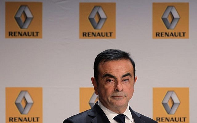CArlos Ghosn, alors PDG de Renault, lors d'une conférence de presse à Sandouville, le 30 septembre 2014. (Crédit : CHARLY TRIBALLEAU / AFP)