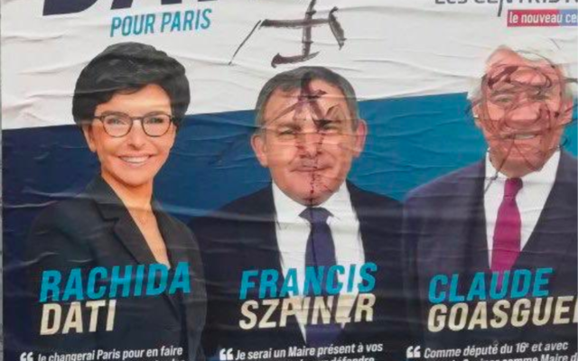 Une affiche électorale de Francis Szpiner, Claude Goasguen et Rachida Dati (LR), taguée d’une croix gammée, dans le 16e arrondissement parisien. (Crédit : Claude Goasguen / Twitter)
