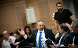Le député du Likud Eliyahu Revivo assistant à une réunion d'une commission spéciale à la Knesset, à Jérusalem, le 25 décembre 2022. (Crédit : Yonatan Sindel/Flash90)