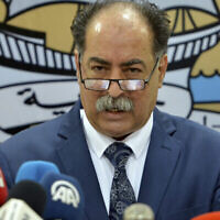 Le ministre tunisien de l’Intérieur Kamel Fekih s’exprime lors d’une conférence de presse à Tunis, le 11 mai 2023. (Crédit : AP/Hassene Dridi)