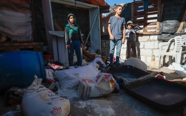 Des sacs de farine qui auraient été éventrés par des réservistes de Tsahal, lors d'un raid sur le hameau palestinien de Halat al-Daba, le 8 décembre 2023. (Crédit : The Villages Group)