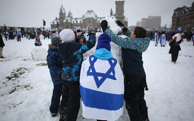Manifestation en soutien à Israël à Ottawa, au Canada, le 4 décembre 2023. (Crédit : Dave Chan / AFP)