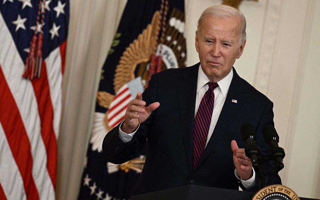 US President Joe Biden addresses mayors attending the US Conference of Mayors Winter Meeting in the East Room of the White House in Washington, DC, on January 19, 2024. (Photo by Brendan SMIALOWSKI / AFP)