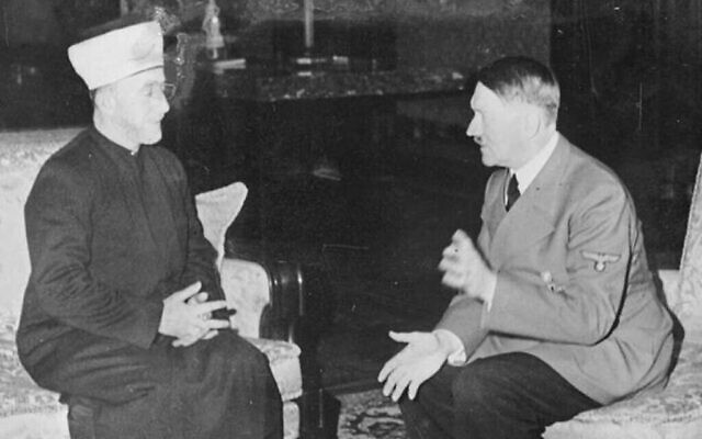 Haj Amin al-Husseini, grand mufti de Jérusalem et président du Conseil suprême islamique, avec le dictateur allemand Adolf Hitler en 1941. (Archives fédérales allemandes via Wikimedia Commons)